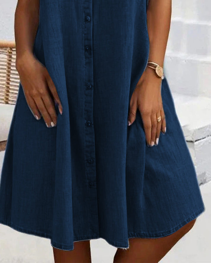 Simple yet elegant women's midi blouse dress with button closure. A-line silhouette, long sleeves for versatile daily fashion.