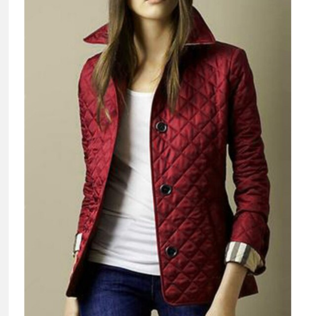 Casual women's quilted jacket with button-down front, a stylish and lightweight layering piece for all seasons.