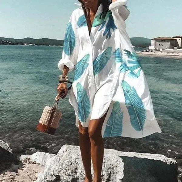 Chic women's long sleeve button-down beach cover-up, ideal for vacation outfits and swimwear.