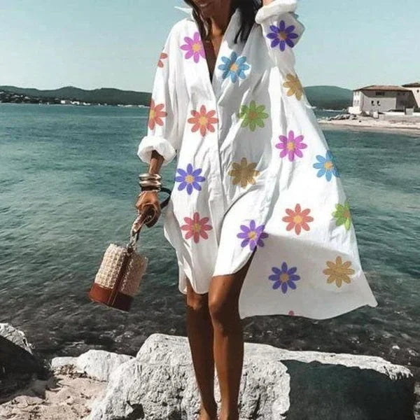 Women's elegant long sleeve cover-up top for sun protection. Great for beachwear and vacations.