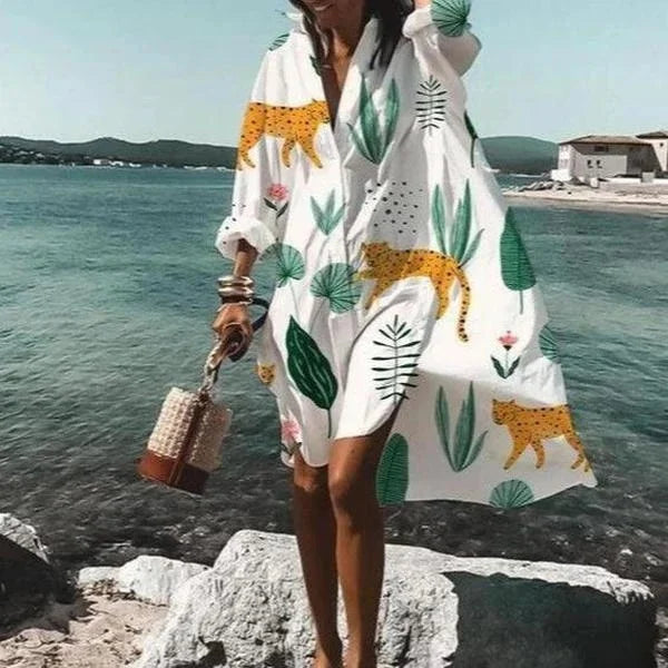 Trendy women's long sleeve cover-up top, enhancing any beachwear or resort ensemble with style.