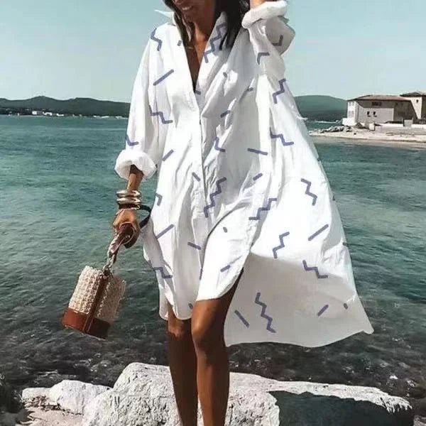Women's long sleeve beach cover-up top, providing sun protection and a chic look for summer.