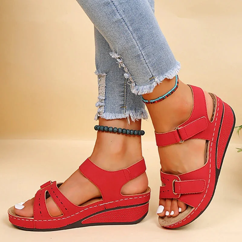 Supportive women's walking sandals, ergonomic orthopedic design for active outdoor comfort.