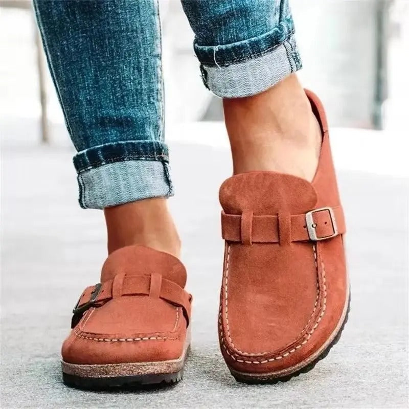 Cozy women's orthopedic slippers, non-slip, cushioned for indoor comfort & foot support.
