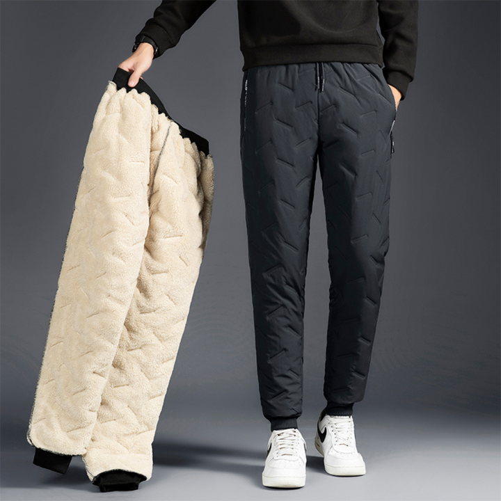 Insulated women's waterproof hiking pants, perfect for cold weather activewear & outdoor adventures.