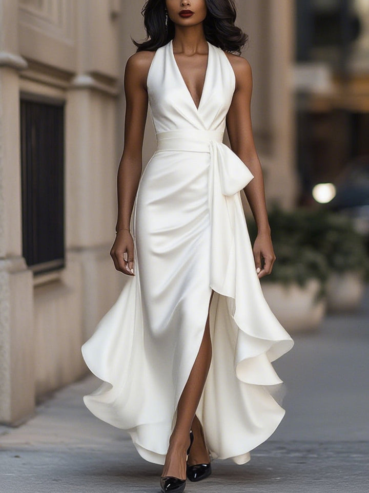 Chic women's sleeveless V-neck wrap dress, a stylish midi with a flattering high-low hem, great for events.