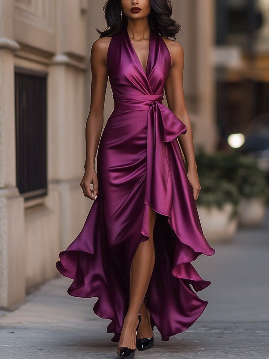 Fashionable women's sleeveless V-neck wrap midi dress, featuring a trendy high-low hem; perfect cocktail attire.