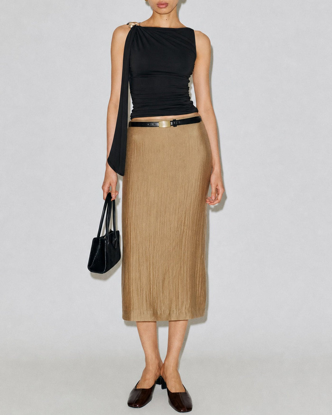 Sleeveless boat neck wrap top for women, chic & casual everyday wear.