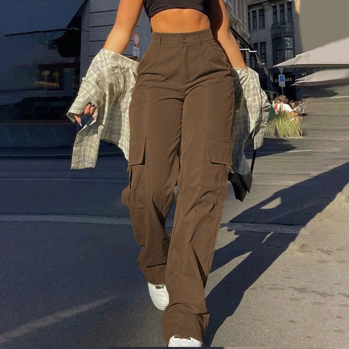 Women's high waist baggy cargo pants with multiple pockets, perfect for streetwear & urban fashion.