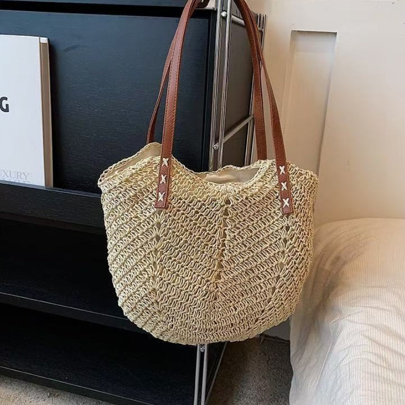 Comfortable women's woven shoulder bag, a stylish crochet-style beach tote for summer fashion.