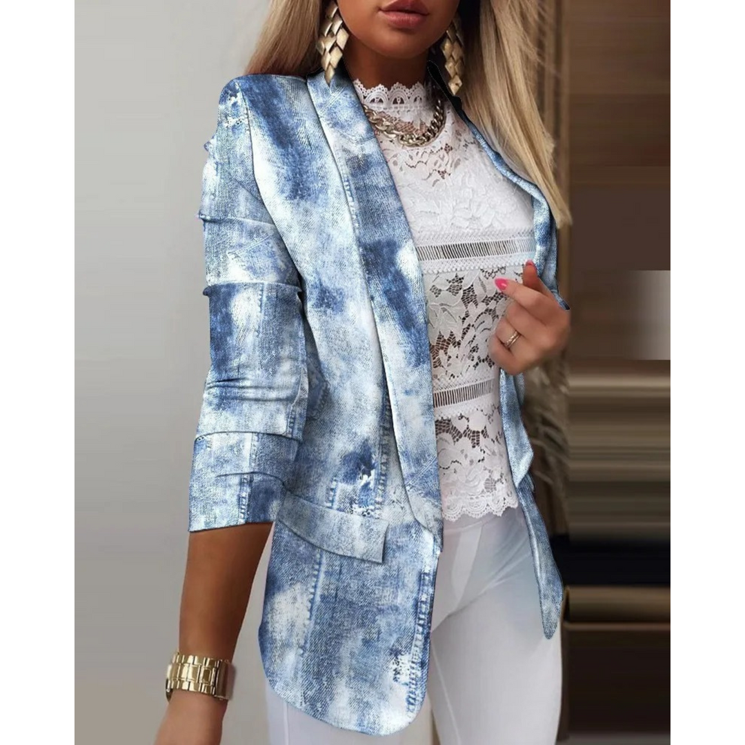Model showcasing a chic women's printed blazer with a lapel collar, styled for a sophisticated yet effortless look.