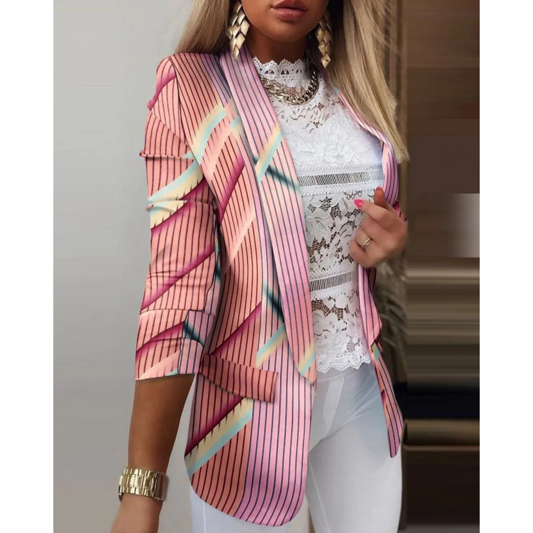 Full view of a woman wearing a trendy printed lapel blazer, perfect outerwear for a polished women's clothing ensemble.