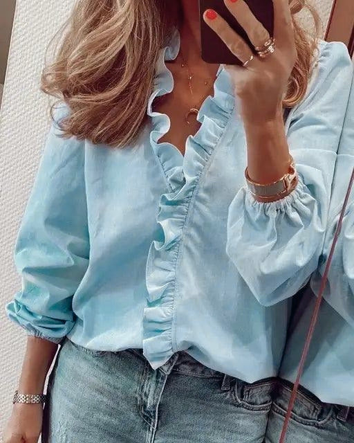 Elegant women's ruffle V-neck blouse in a versatile long sleeve design, perfect for casual or dressy wear.