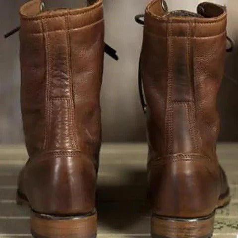 Supportive men's durable combat and outdoor ankle boots. Rugged all-weather footwear for hiking, work, and adventure.