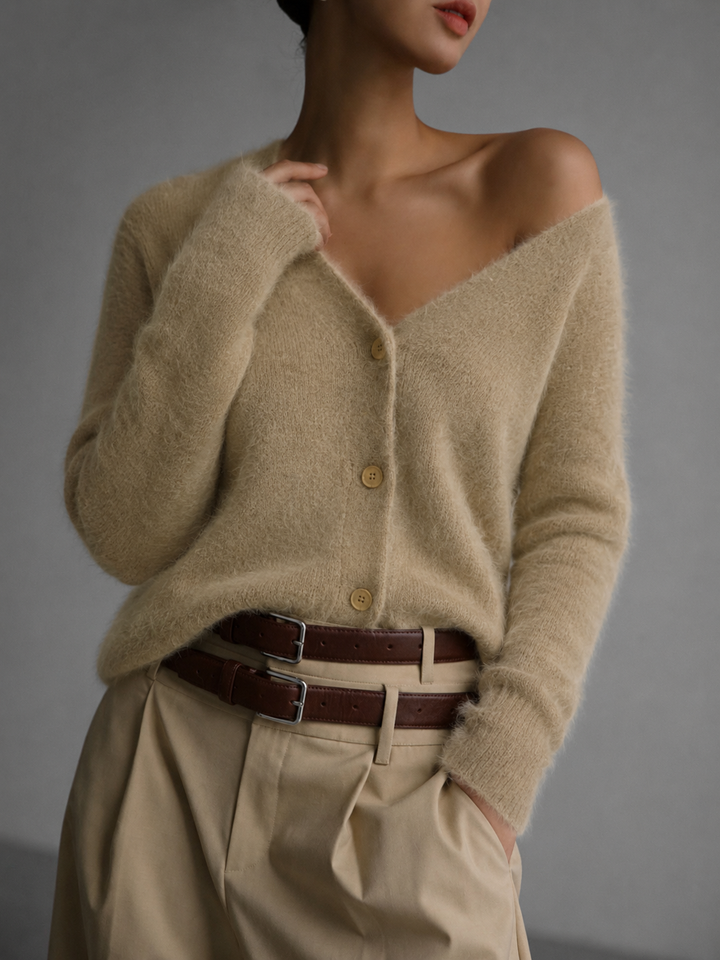 Women's oversized khaki button-up cardigan with relaxed fit, perfect for casual layering. Cozy long-sleeve knitwear.