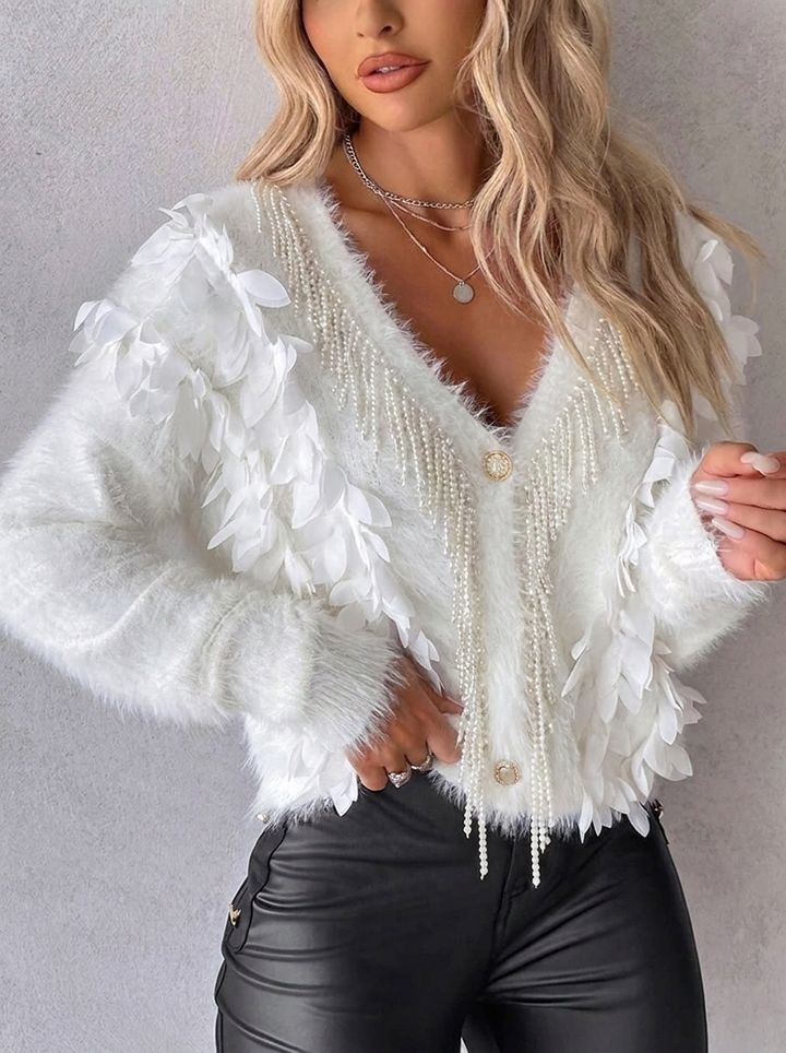 Women's fluffy oversized V-neck cardigan with unique petal sleeves. Elegant long-sleeve sweater.