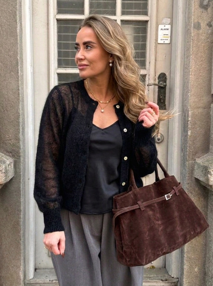 Cozy women's oversized button-front cardigan, round neck, ideal for stylish fall & spring outerwear. Relaxed fit.