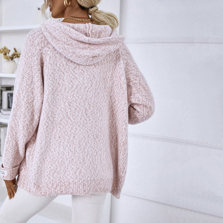 Women's cozy zip-up hooded cardigan, perfect for a layered look in cool weather.