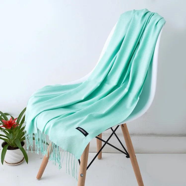Versatile women's cashmere scarf, luxurious knit wrap with fringe.