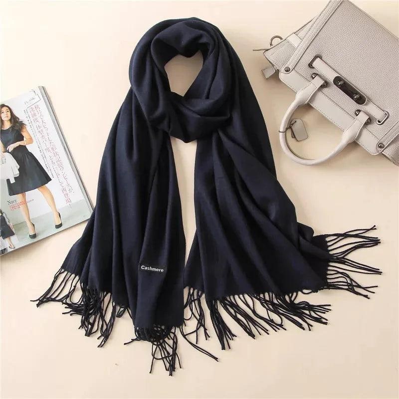 High-quality cashmere wrap for women, elegant knit scarf with fringe.