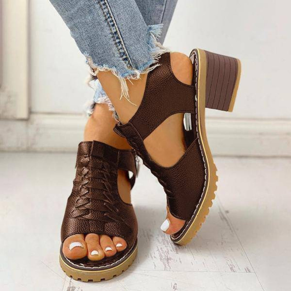 Modern women's chunky heel peep toe sandals, versatile for fashion-forward looks and comfort.