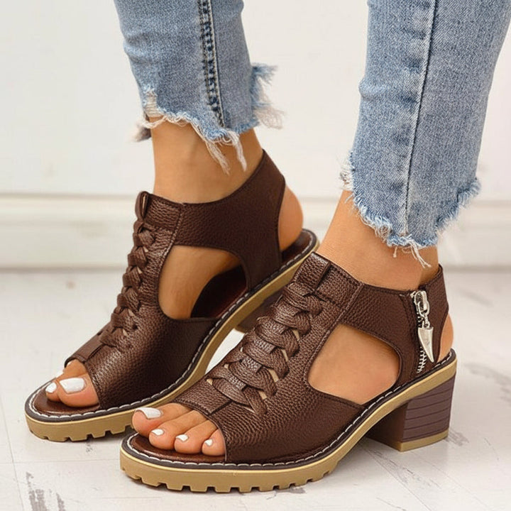 Summer fashion: trendy women's peep toe sandals with a chunky heel, perfect for warm weather.