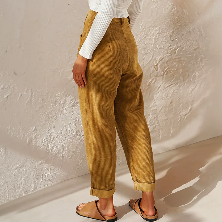 Stylish women's high-waist wide-leg corduroy pants, featuring a soft textured fabric. Perfect for everyday wear.