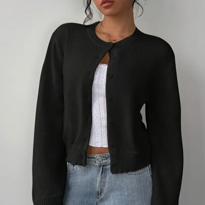 Women's cropped button-up cardigan with ribbed trim, perfect for stylish layering.