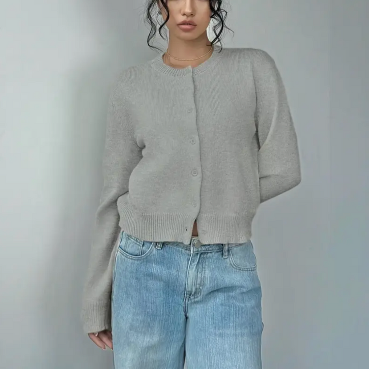 Trendy women's cropped knit cardigan, versatile button-up style with soft ribbed details.