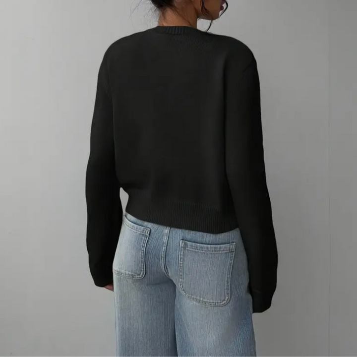Elegant women's cropped knit cardigan, versatile button-up top for fashion outfits.