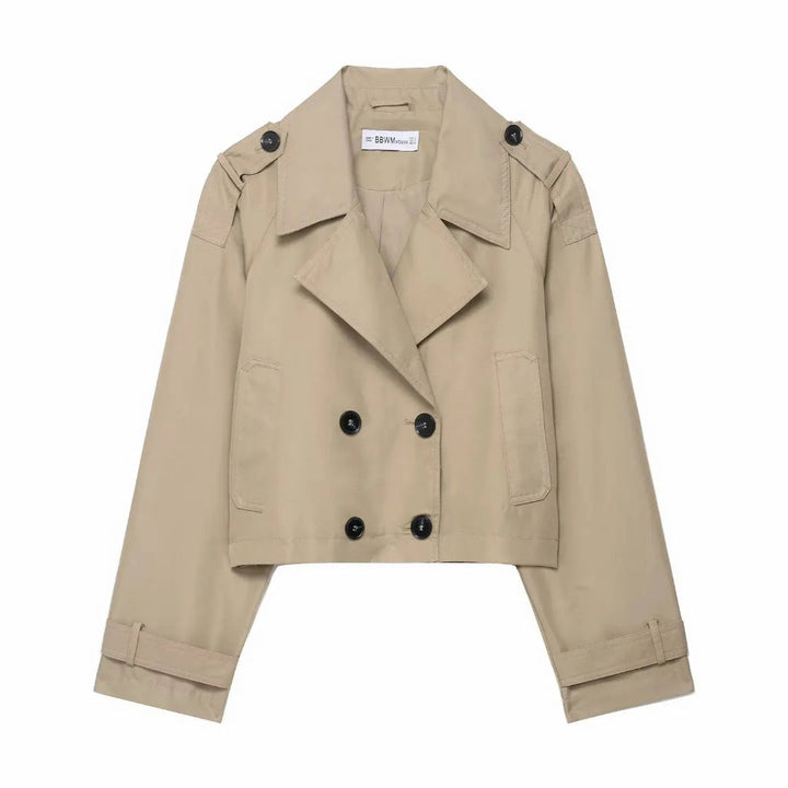 Stylish women's cropped trench coat, a short outerwear jacket with a chic double-breasted design for autumn fashion.