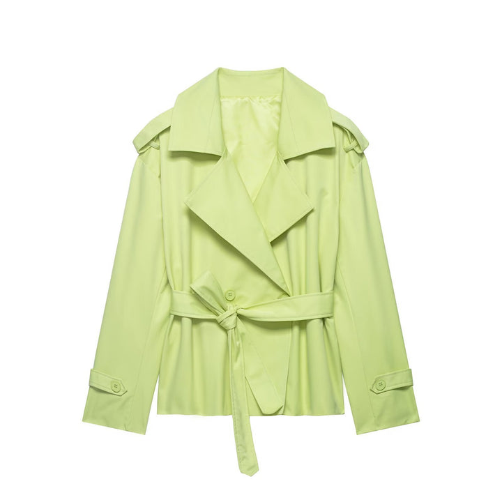 Elegant women's cropped trench coat with a sophisticated oversized lapel design and cinched belted waist for a sleek look.