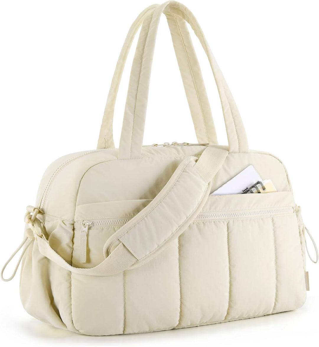 Beige women's versatile duffle bag, perfect for gym, travel, and work. Stylish and spacious shoulder carryall.