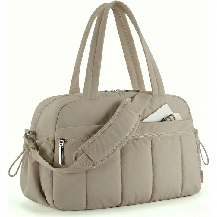 Taupe women's duffle work bag, a versatile everyday carryall. Perfect for professional and casual use.