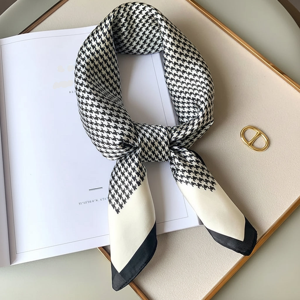 Display of a versatile women's scarf, suitable as a neck, hair, or handbag accessory.