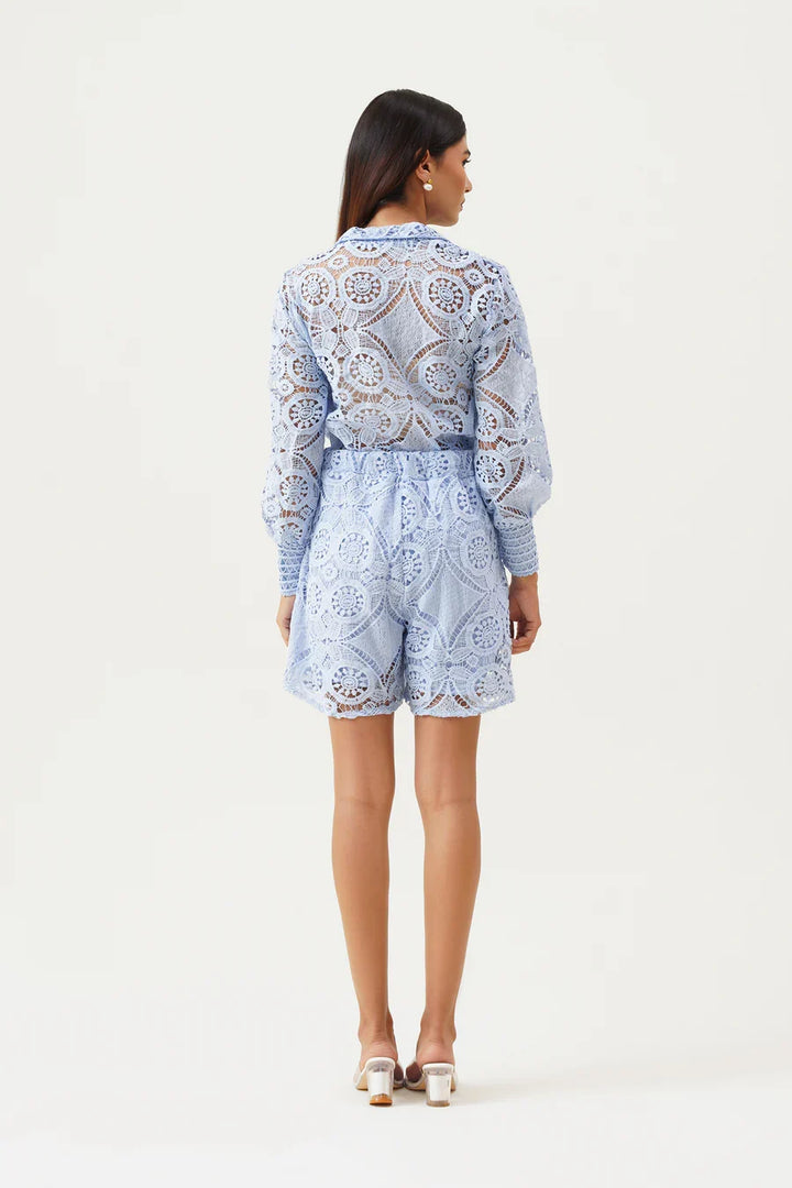 Versatile women's elegant formal playsuit. Button front & puff sleeves offer a sophisticated, smart casual look.