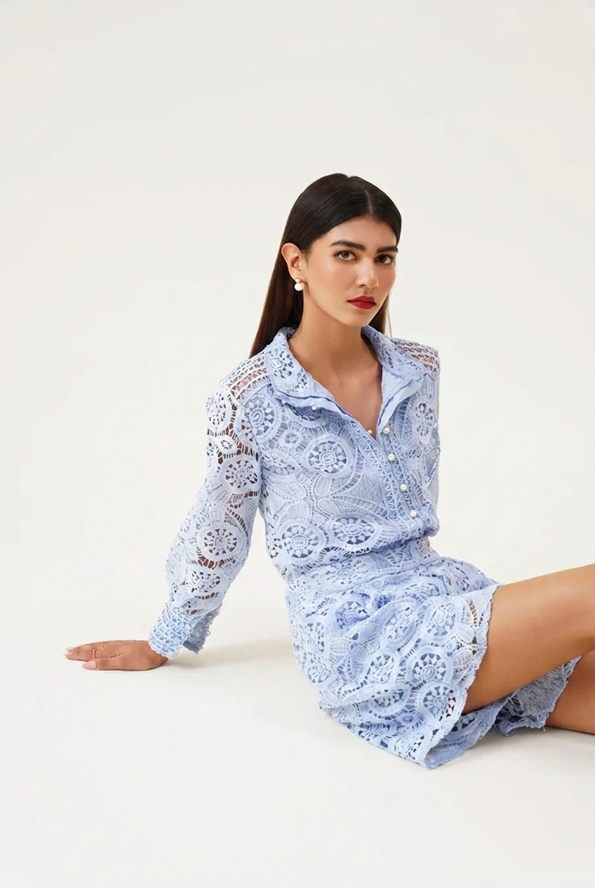 Women's elegant formal playsuit. Button front, puff sleeves. Perfect for professional or smart casual events.