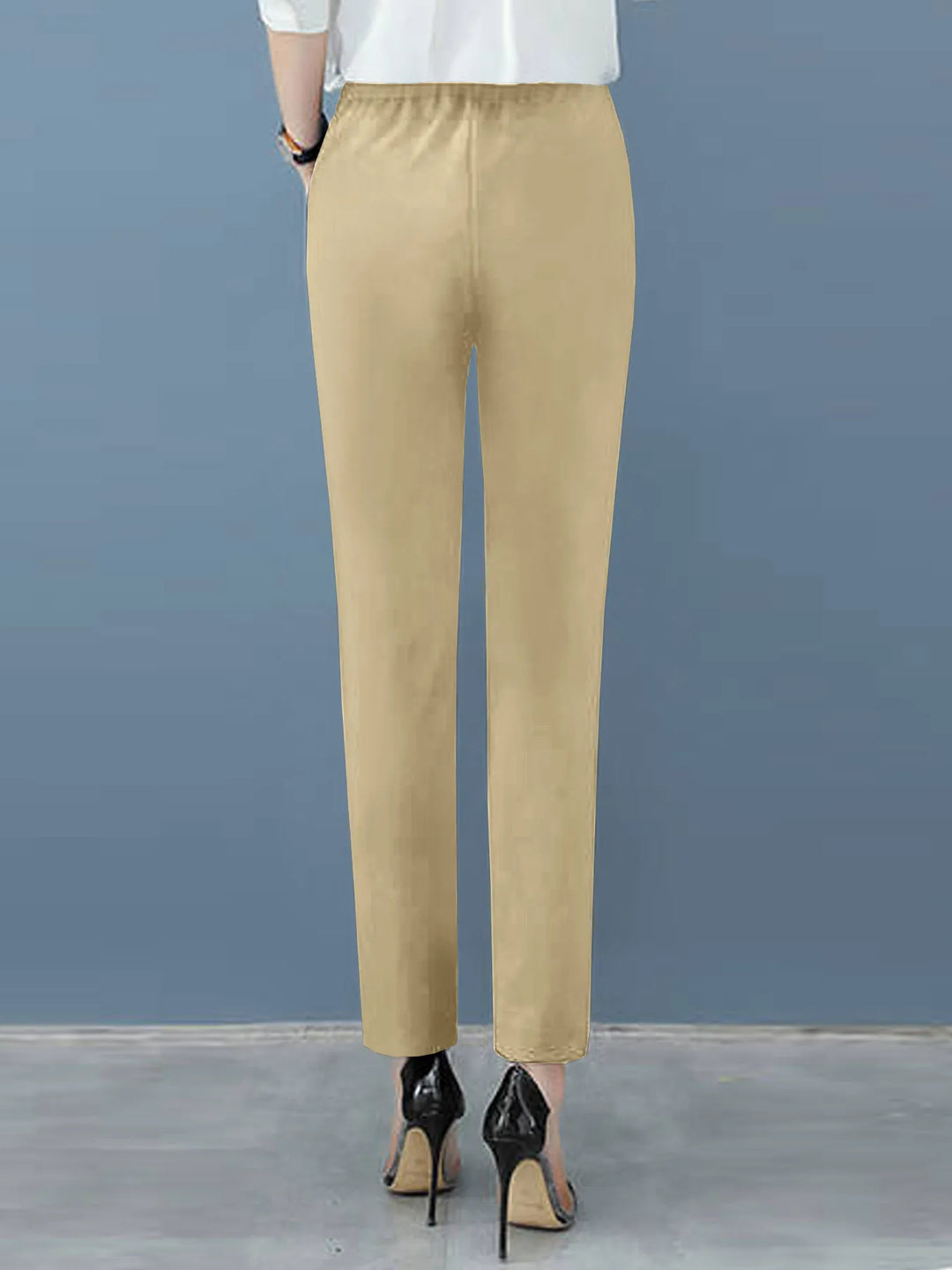 Flattering women's high waist work pants with tapered leg and pleats, excellent for modern professional attire.