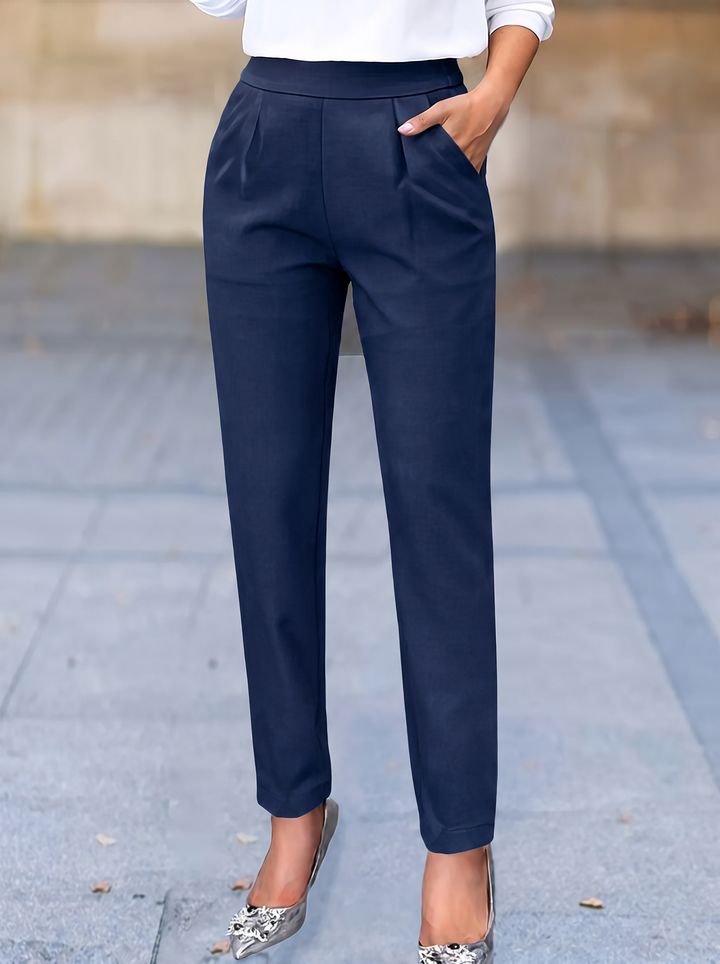 Women's high waist tapered professional pants, featuring flattering pleats for a polished and comfortable fit.