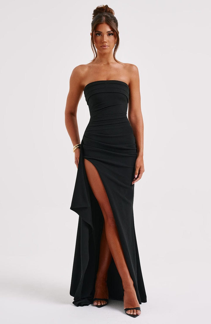 Sophisticated women's formal strapless maxi dress with ruched bodice, high slit; excellent for gala or evening.