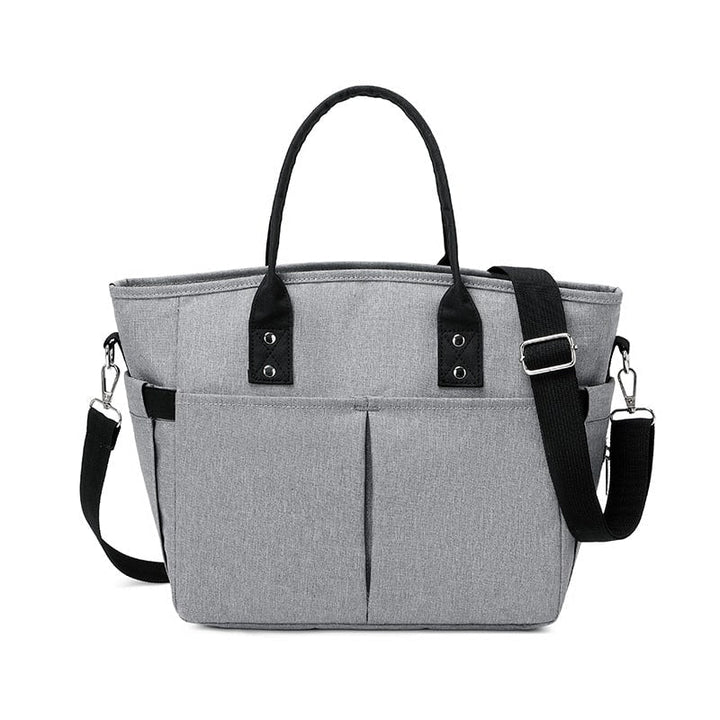 Women's insulated food cooler bag with adjustable strap, great for meal prep, keeping lunches fresh & cold.