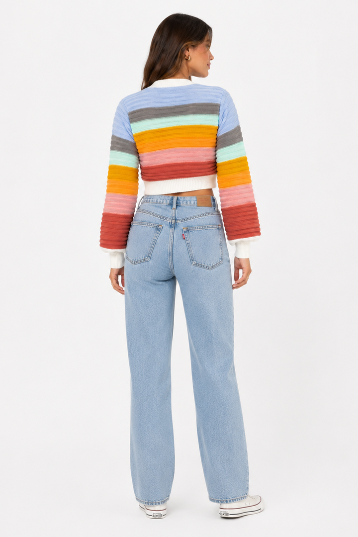 Relaxed fit women's rainbow stripe V-neck cardigan, button-up. Chic, colorful casual fashion, perfect for spring/autumn layering.