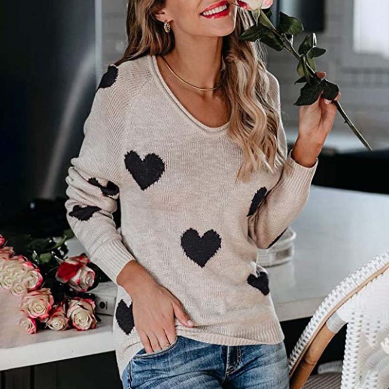Comfortable women's V-neck knit sweater, a cozy long-sleeve top with a charming heart print.