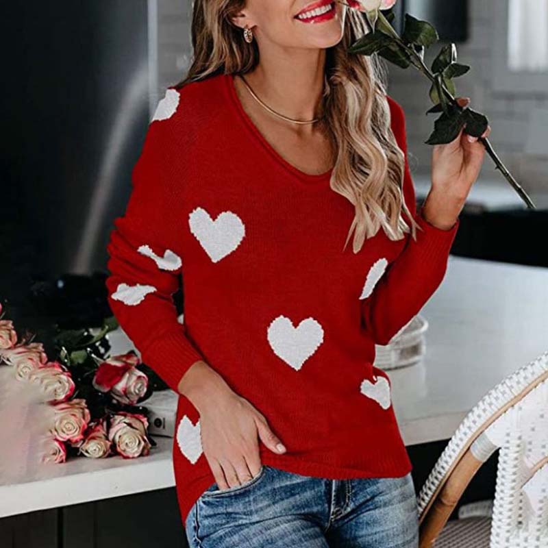 Cozy casual women's knitwear: V-neck long-sleeve sweater with a fun heart print.