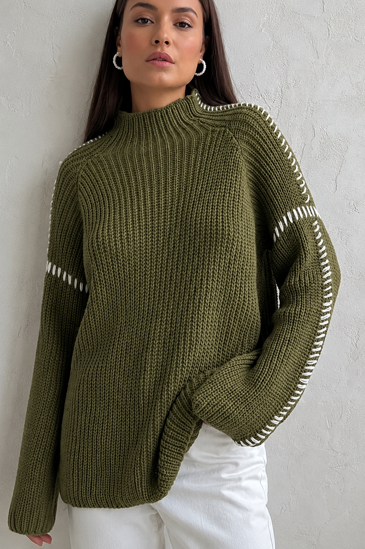 Cozy women's oversized knit jumper, long sleeve mock neck, featuring a chic contrast stitch design.