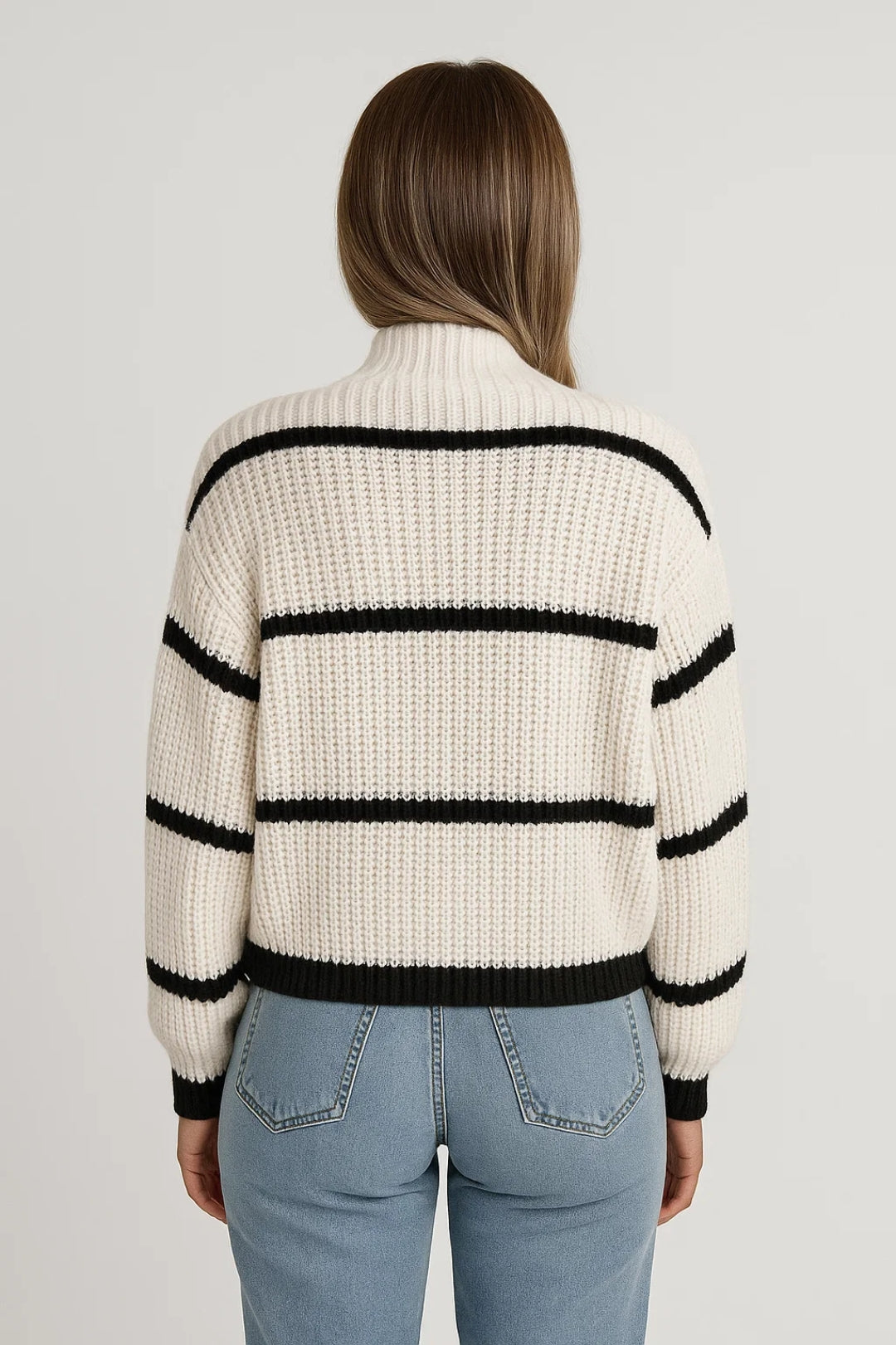 Stylish women's long sleeve striped knit sweater, offering warmth & comfort for chic everyday winter fashion.