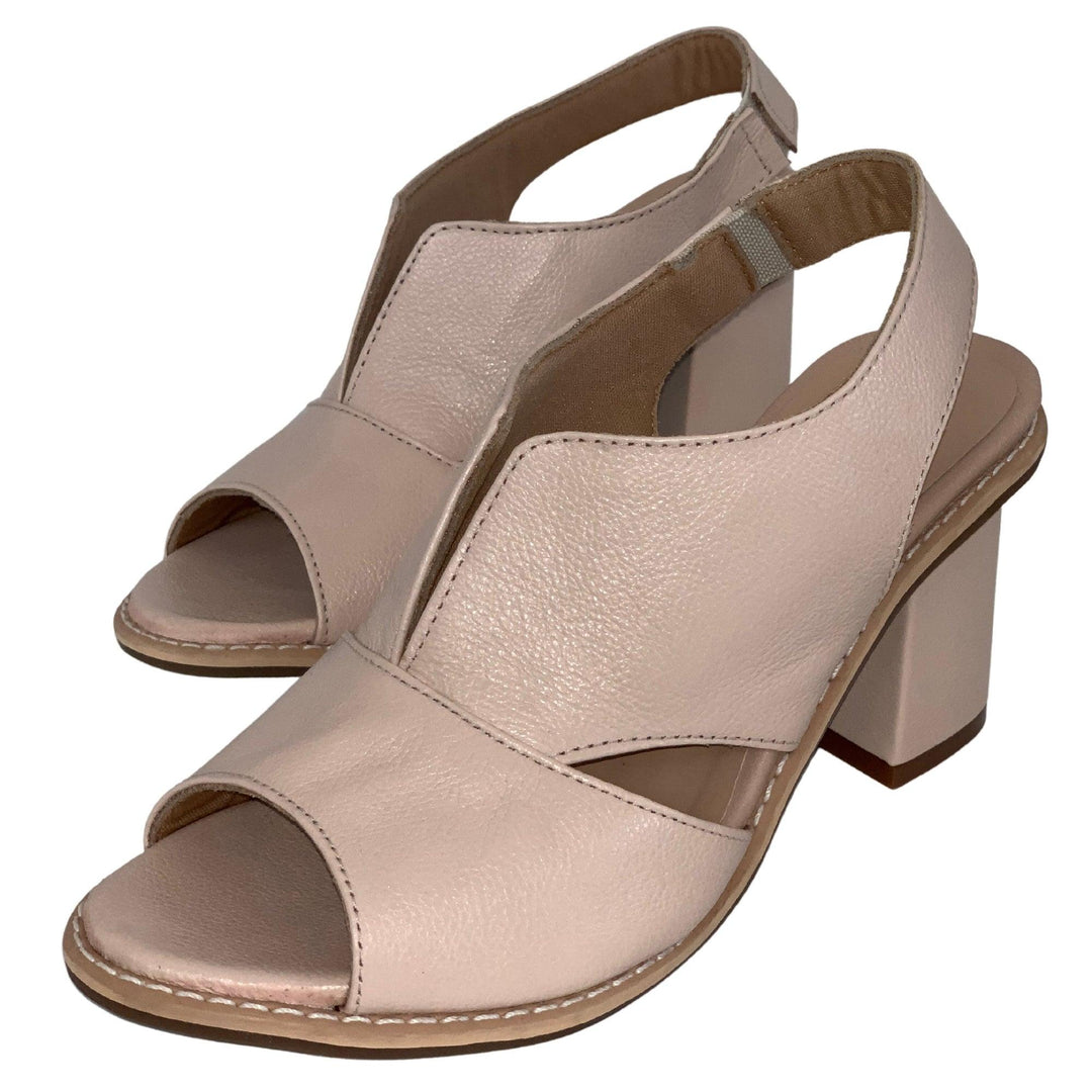 Stylish heeled sandals for women, offering all-day comfort with a supportive footbed and non-slip outsole.
