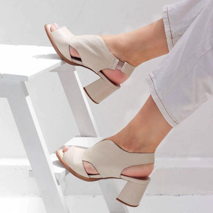 Elegant women's heeled sandals with comfort footbed, perfect for summer dress or casual wear.