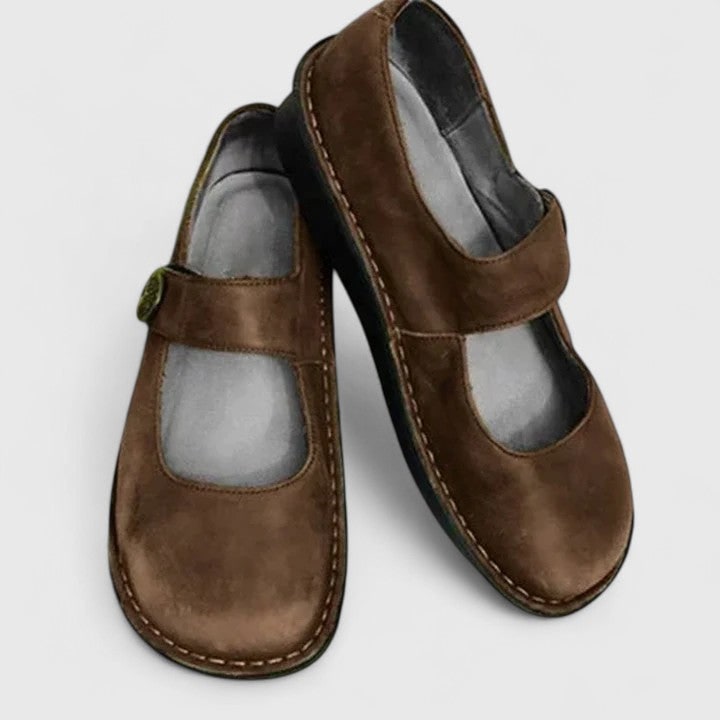 Women's comfort Mary Jane flats offering foot support with a cushioned insole & easy-adjust strap for daily wear.