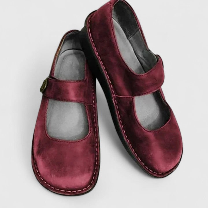 Classic round toe women's Mary Jane flats. Adjustable strap & cushioned insole provide excellent comfort for women.